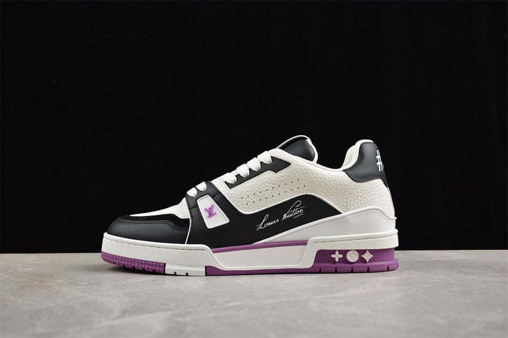 Side profile of the white, black, and purple sneaker