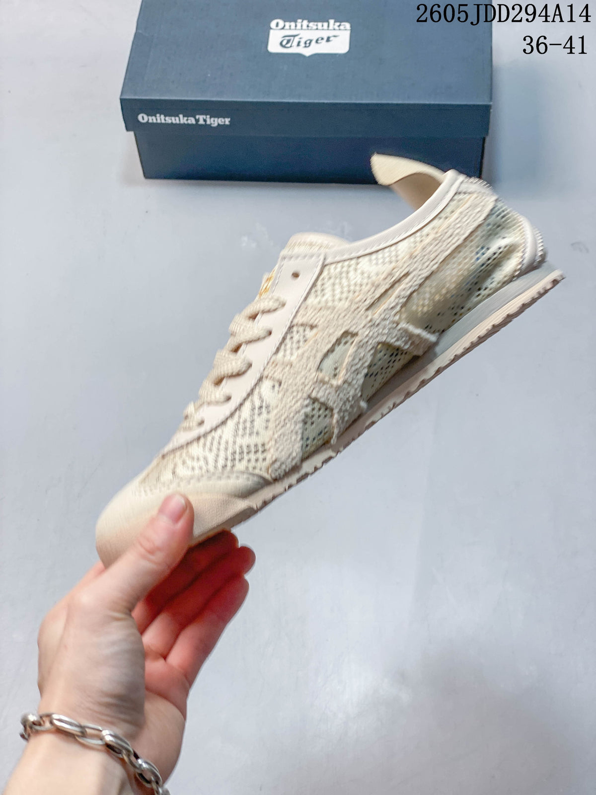 Side profile of a cream Onitsuka Tiger low-top sneaker with patterned panels and side stripes