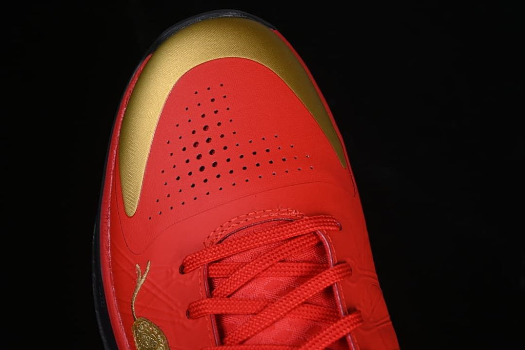 Top view of perforated toe area and gold accent