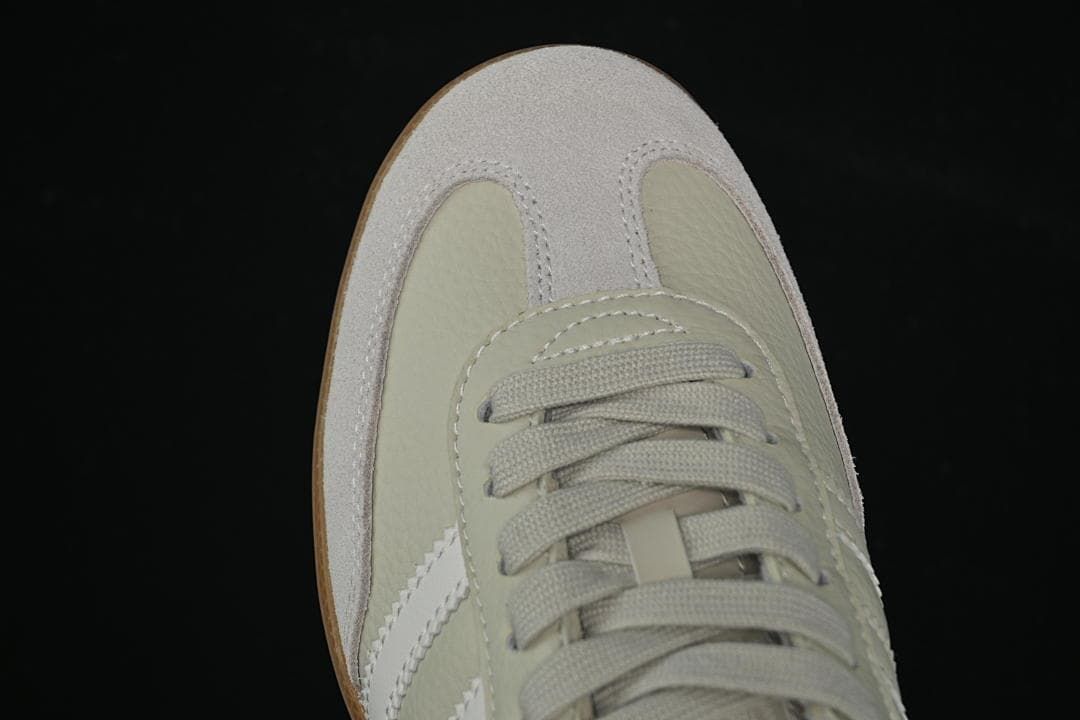Top-down close-up of the laces and toe overlays.