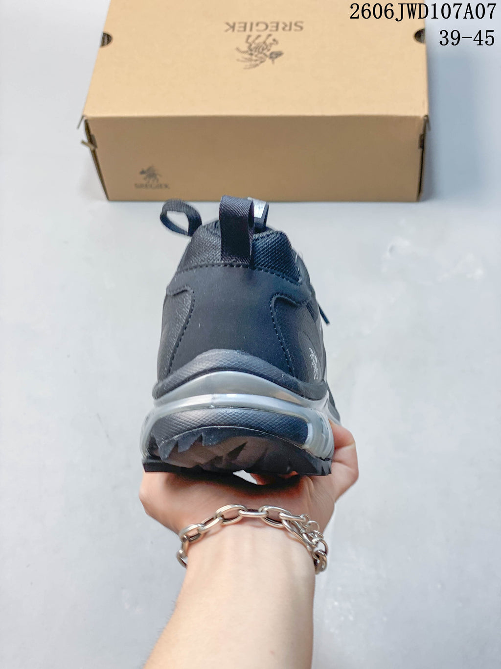 Rear view of a Sregiek hiking shoe showing the heel and outsole