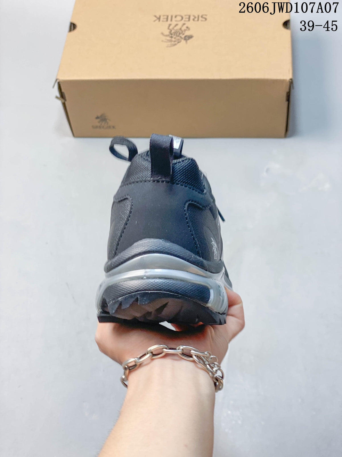 Rear view of a Sregiek hiking shoe showing the heel and outsole