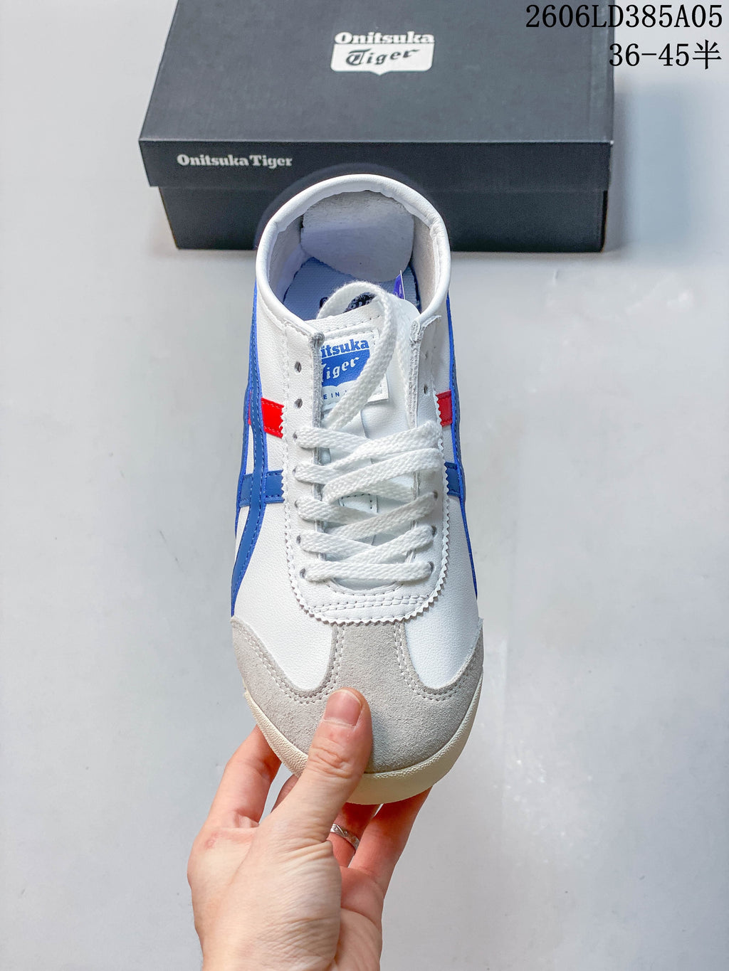 Top view of the sneaker showing white laces and grey toe overlays.