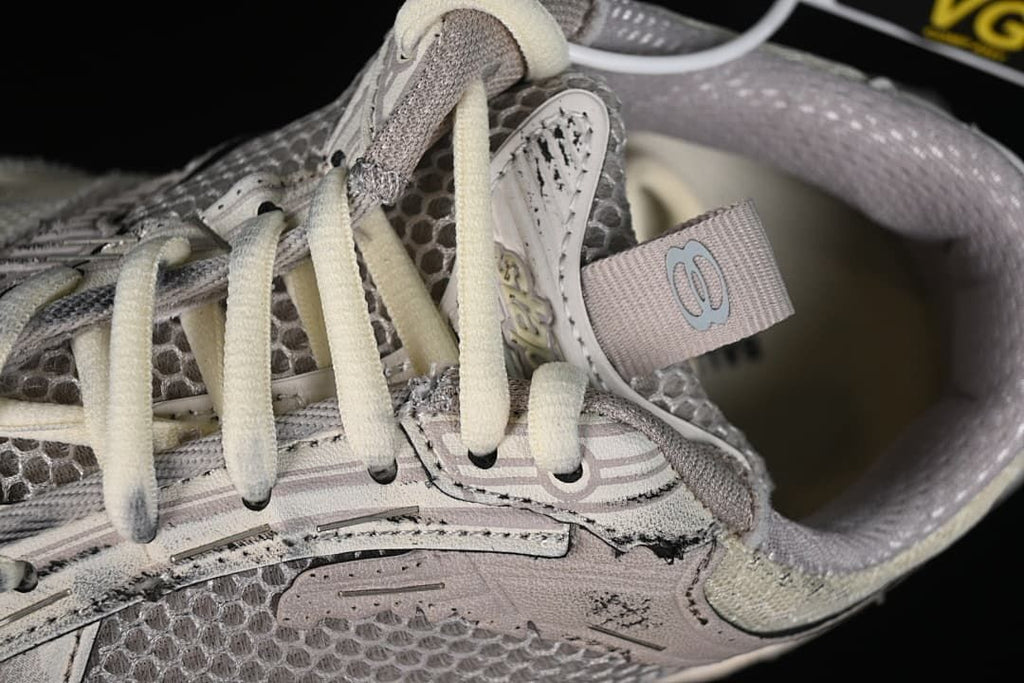 Close-up of the laces, tongue tab and upper details