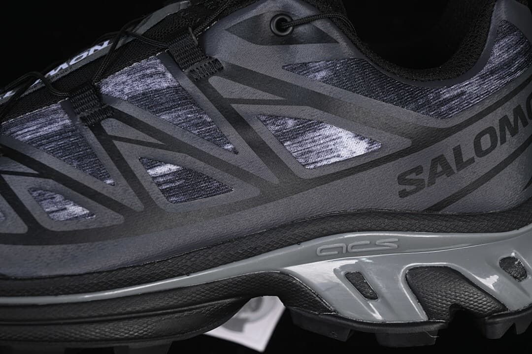 Close-up of the patterned upper, side overlays, and midsole