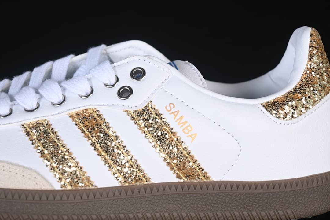 Close-up of the Samba side marking, gold stripes, eyelets, and gum-colored sole