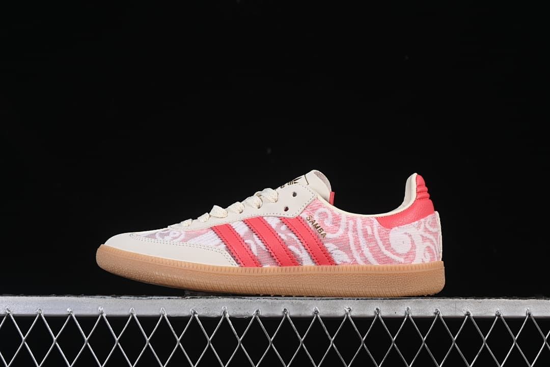 Side view of the ivory, pink, and gum adidas Samba OG sneaker