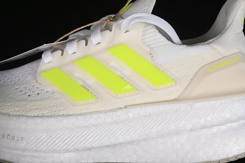 Close-up of the side stripes, laces, and midsole