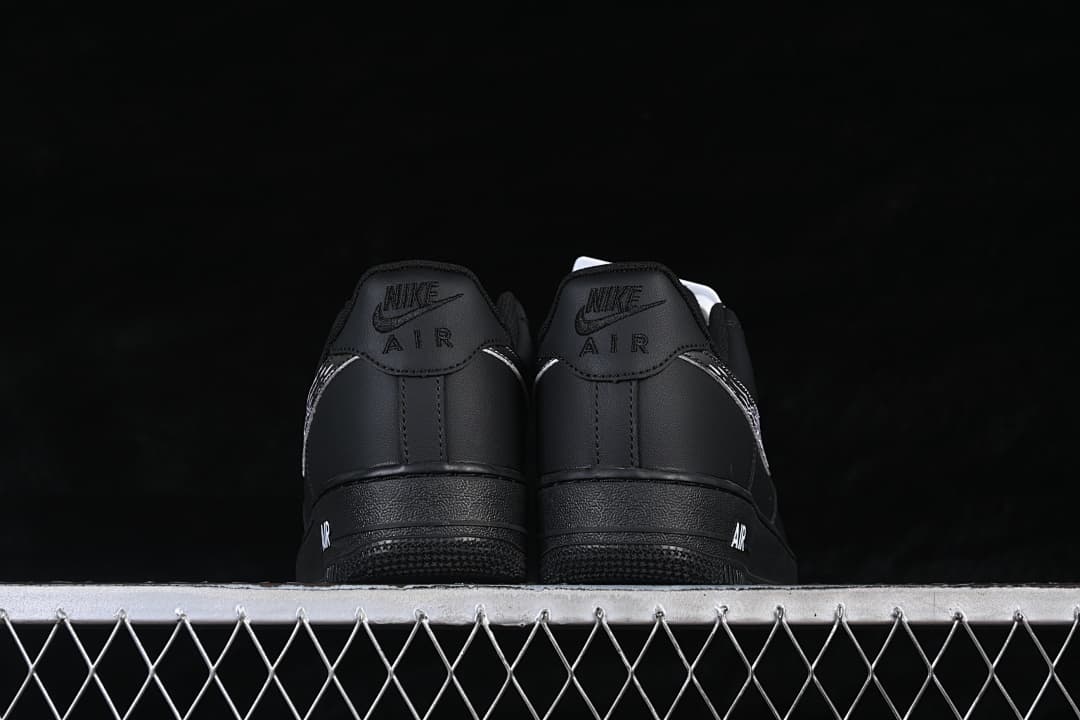 Rear view of the pair showing heel details and black outsoles