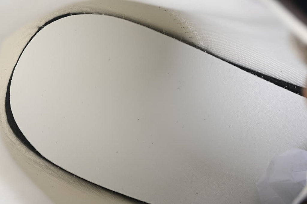 Close-up of the sneaker’s light-colored interior footbed