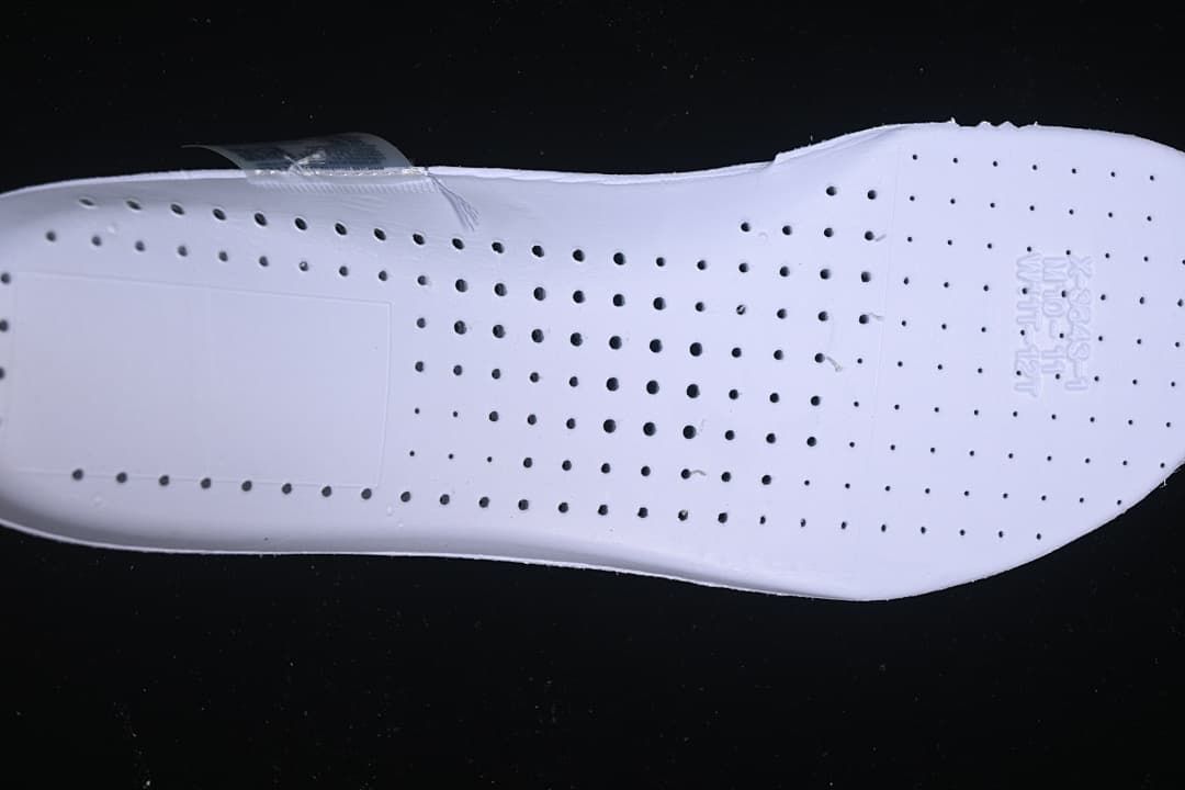 Perforated insole of the Nike running shoe