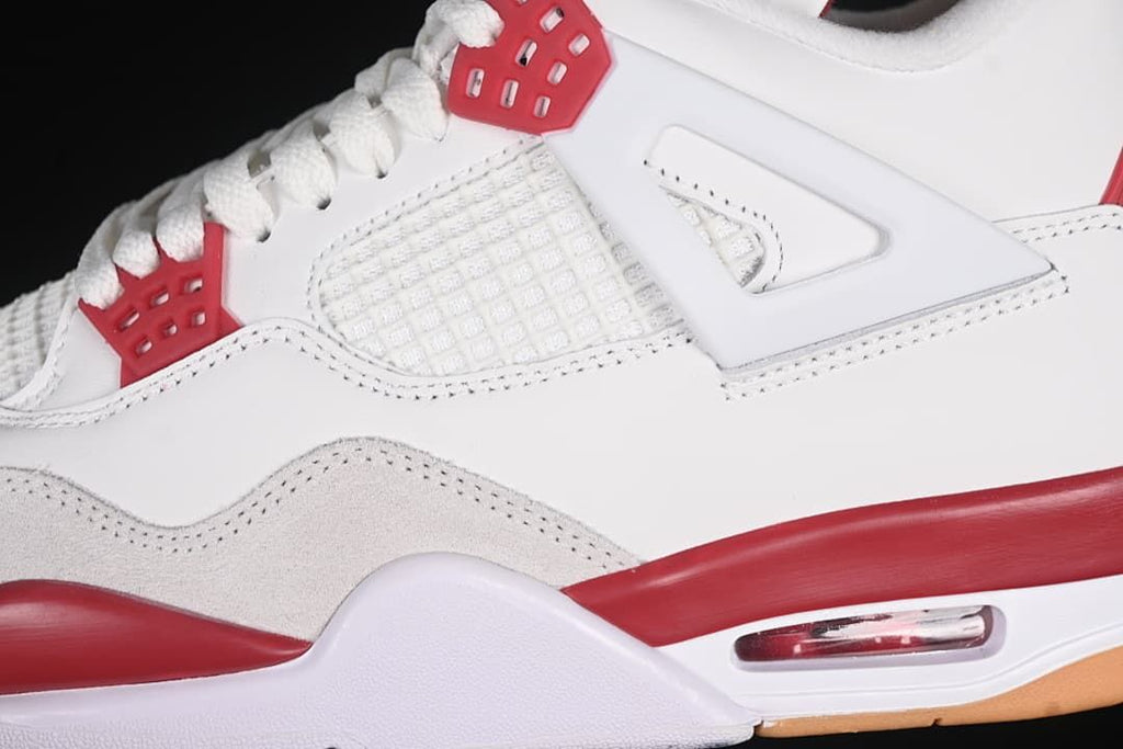 Close-up of the mesh side panel, lace wing, and midsole