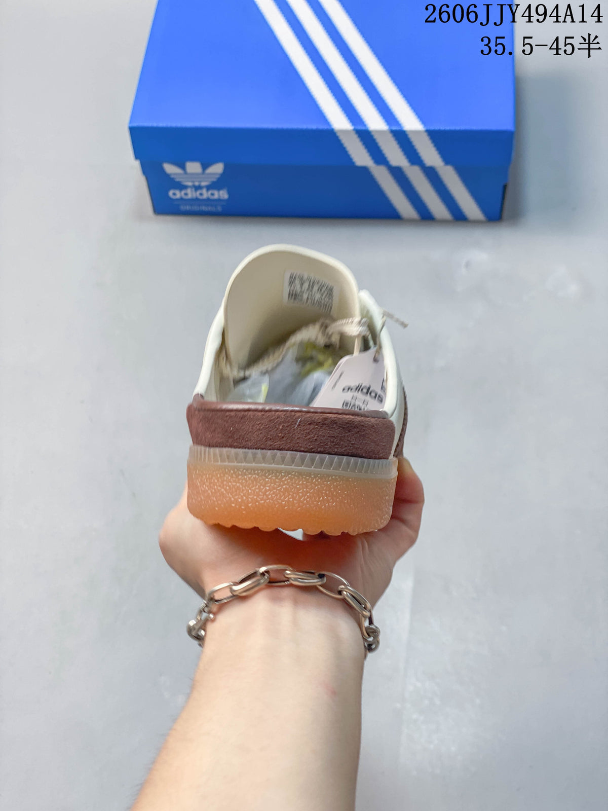 Rear view showing the open-heel mule design and gum-colored sole.