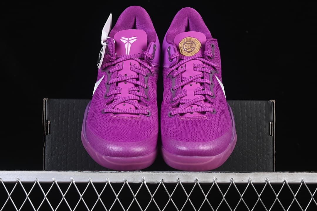 Front view of the purple shoe pair with contrasting tongue details