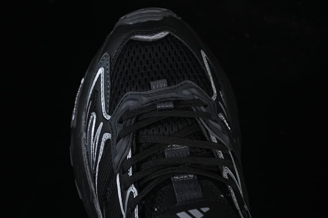 Top view of the black mesh toe and lace-up front