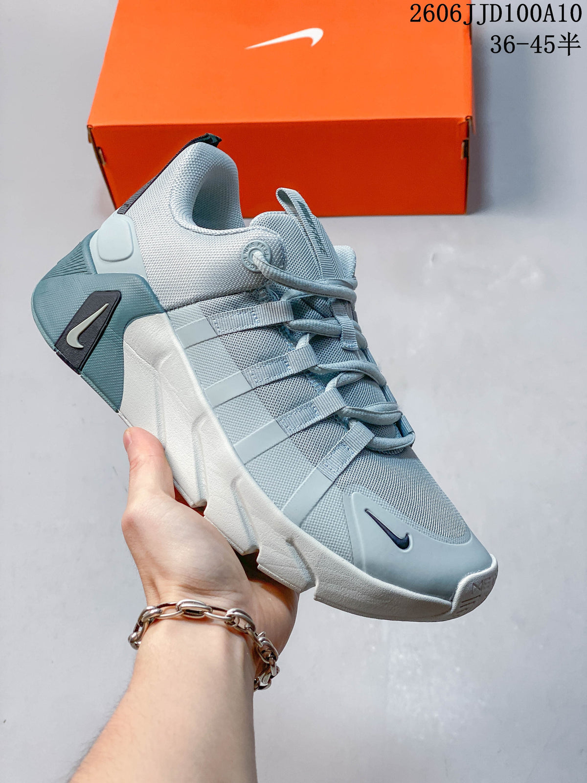 Grey-blue Nike Free Metcon 7 shoe with a white sole.