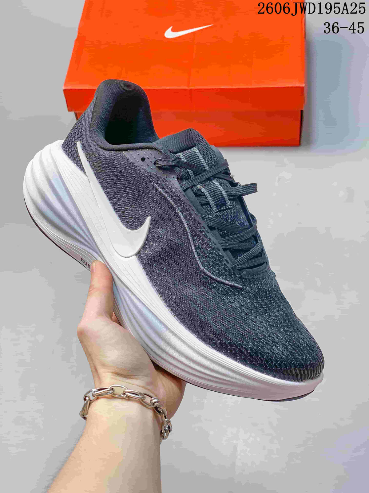 Charcoal running shoe with a white side Swoosh and sculpted white midsole.