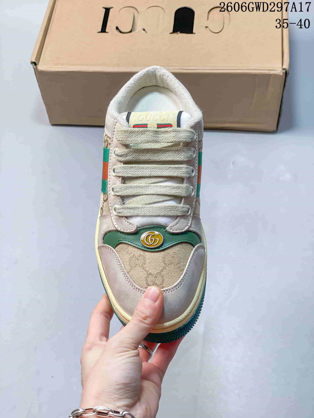 Front view showing the rounded toe, patterned panels, and lace-up design