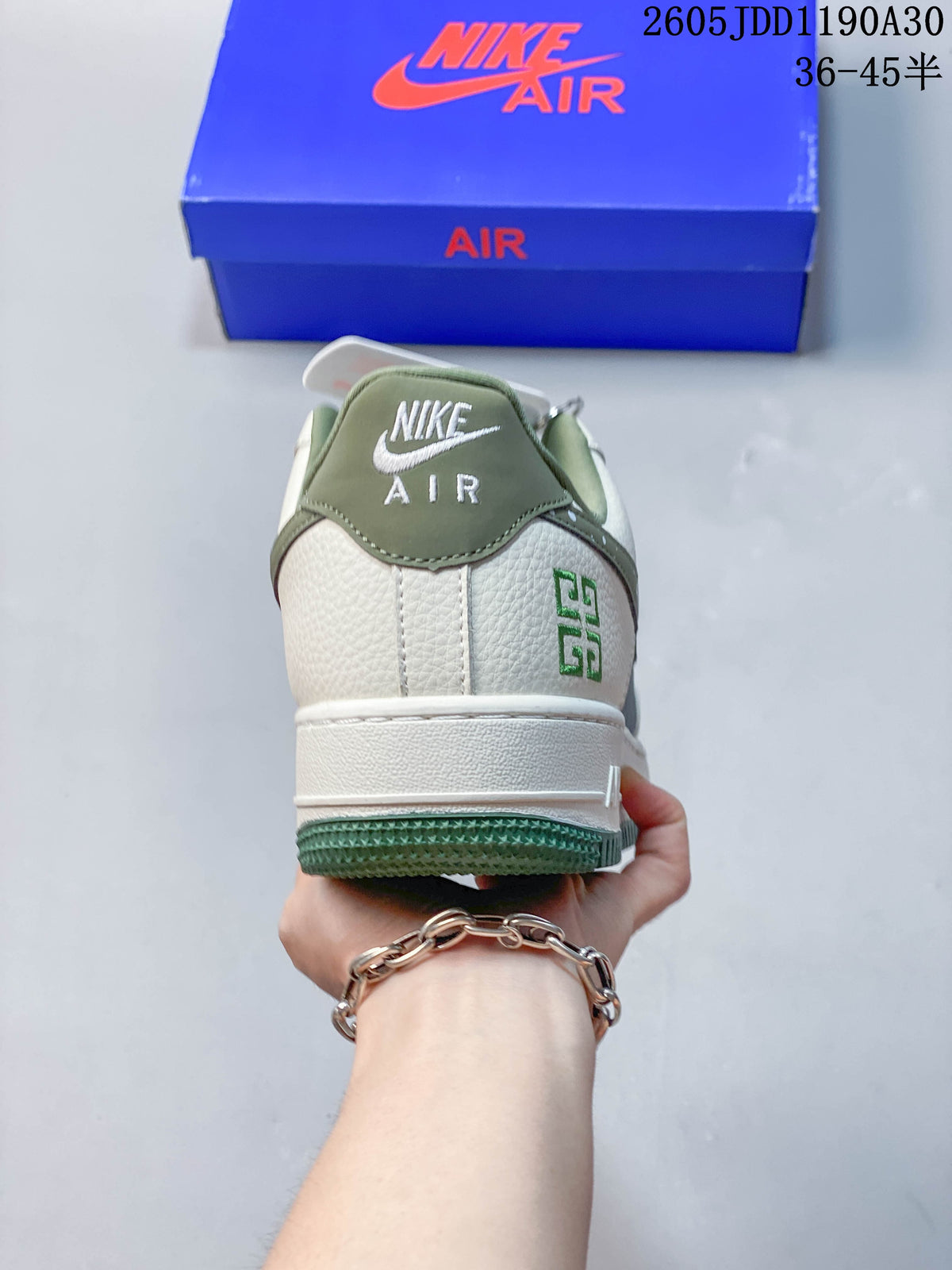 Rear view of the white and green Nike Air Force 1 ’07 LV8 sneaker