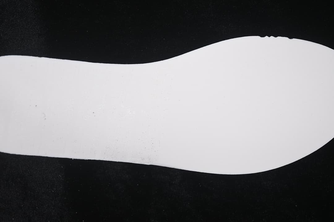 White sneaker midsole shown from the side