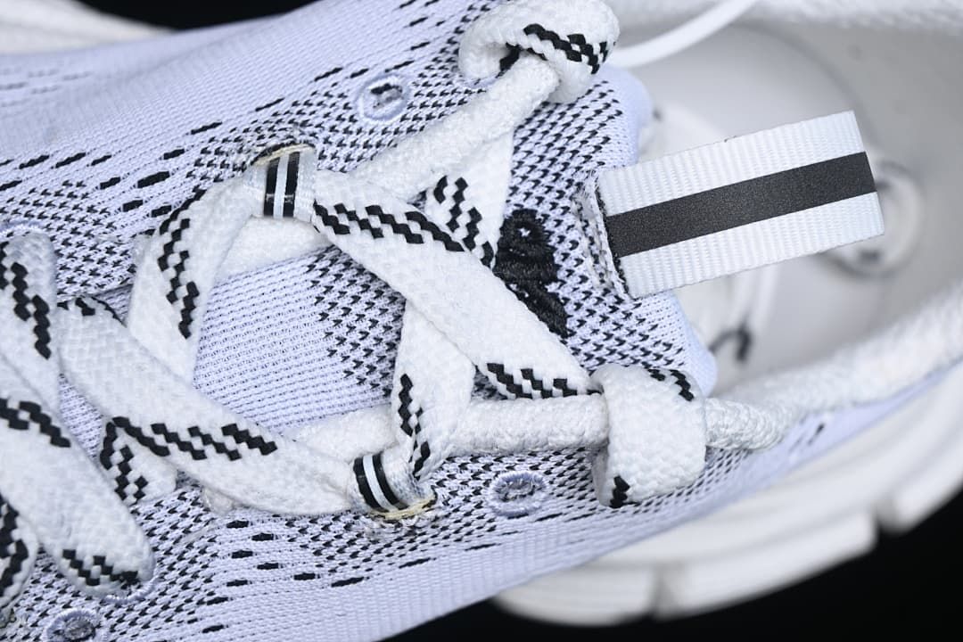 Detail of the lace-up area and striped lace accents.