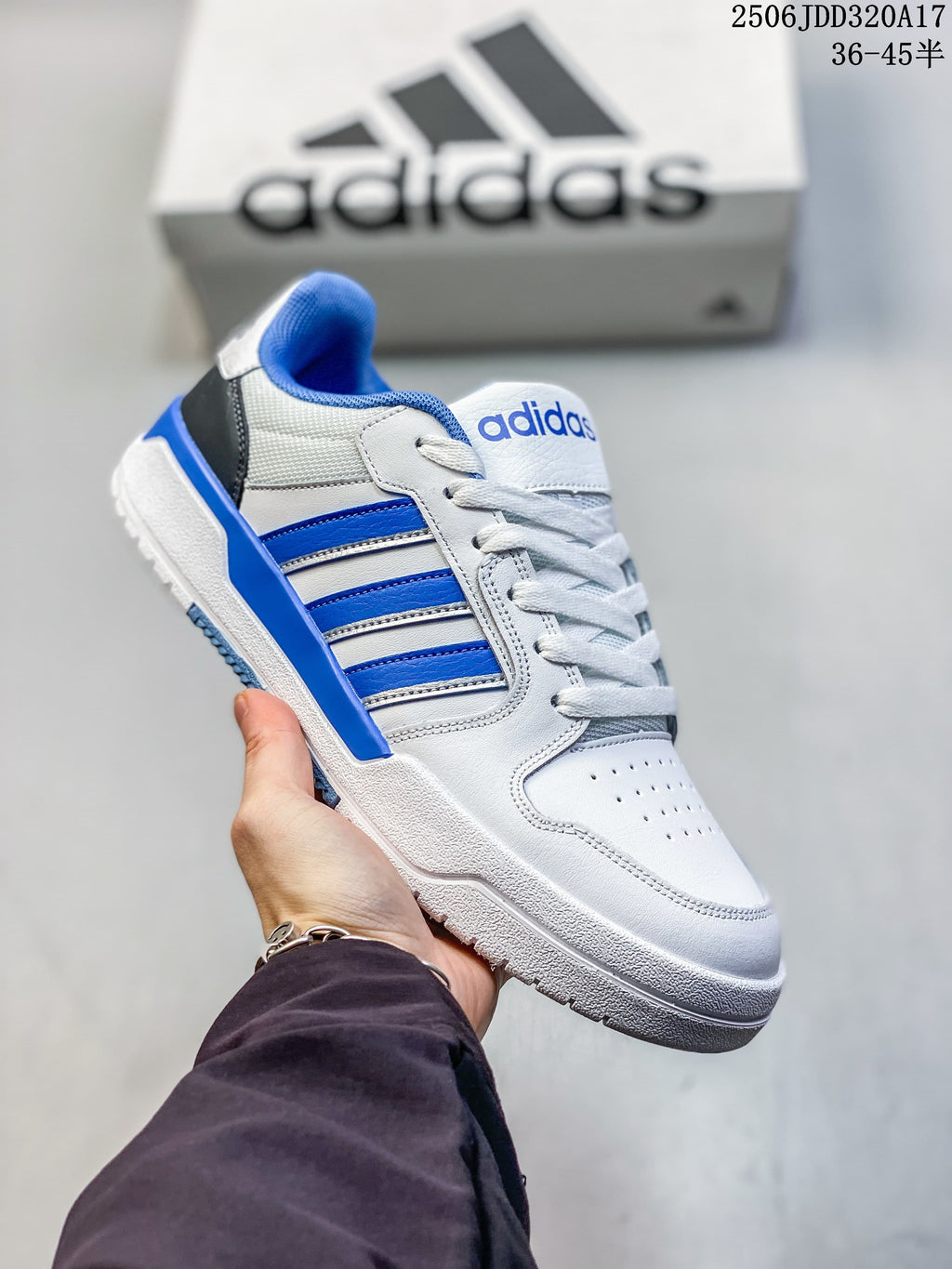 White adidas Entrap sneaker with bright blue accents and white outsole