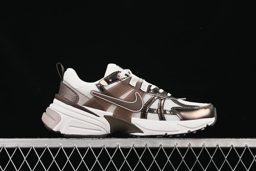 Side profile of the sneaker showing its layered sole and brown accents