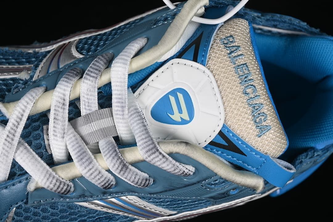 Close-up of the laces, tongue branding and upper panels
