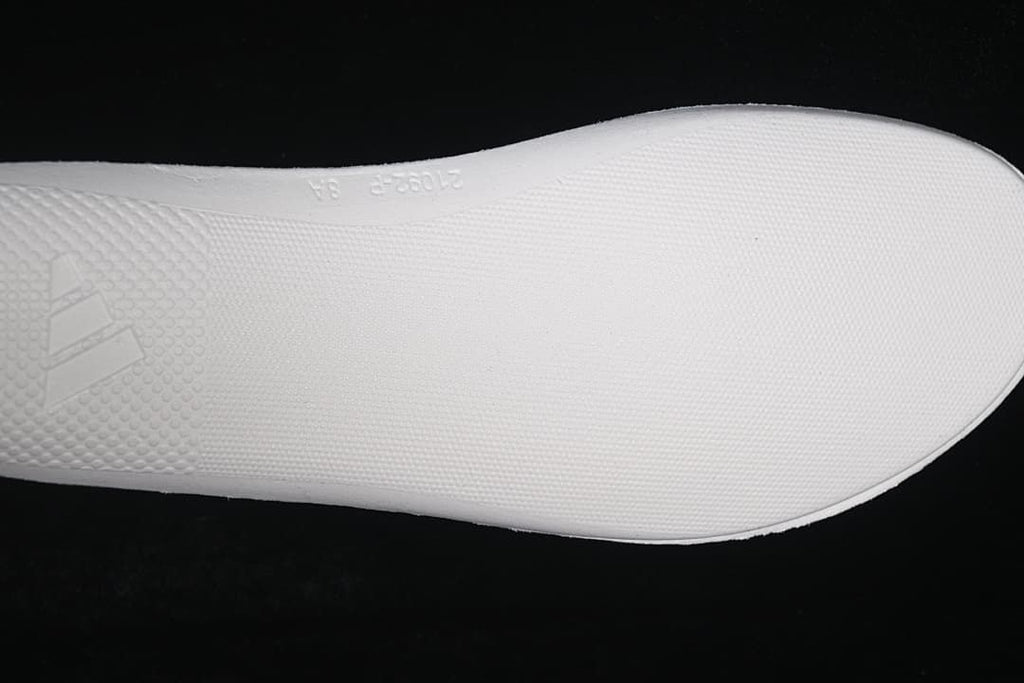 Close-up of the textured white shoe footbed