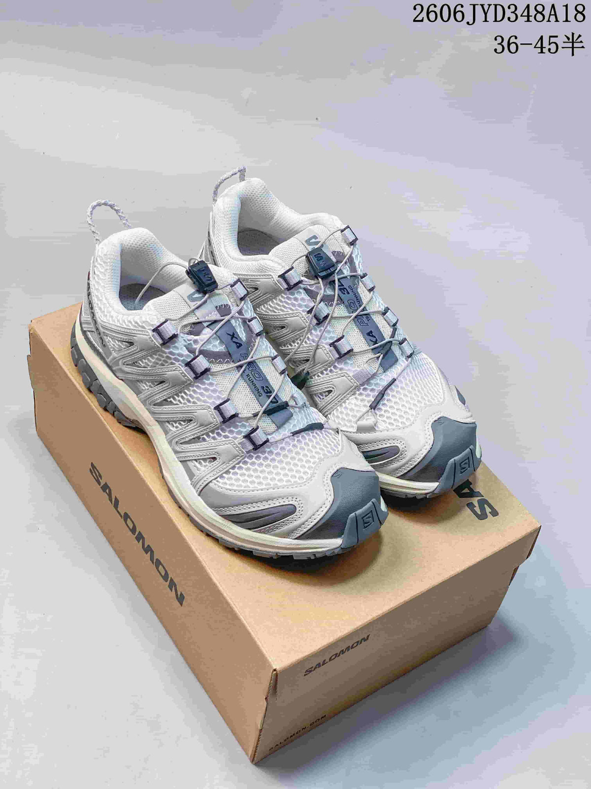 Several Salomon XT-3D shoes shown from the side in different colorways.