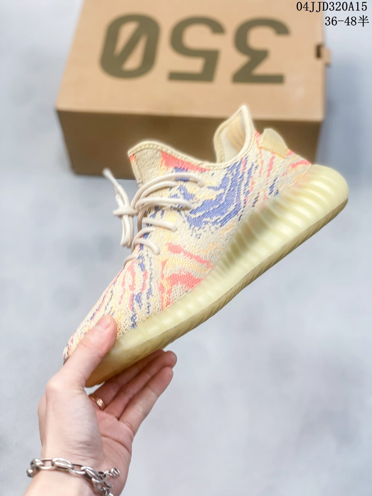 Side view of the multicolor knit-style sneaker with a ribbed sole; image overlay shows sizes 36–48.5 and style code 04JJD320A15.