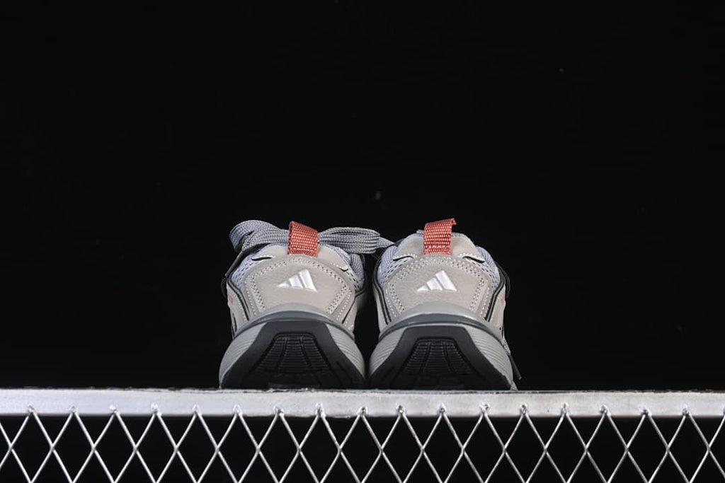 Rear view of the pair showing heel details and dark outsole sections.