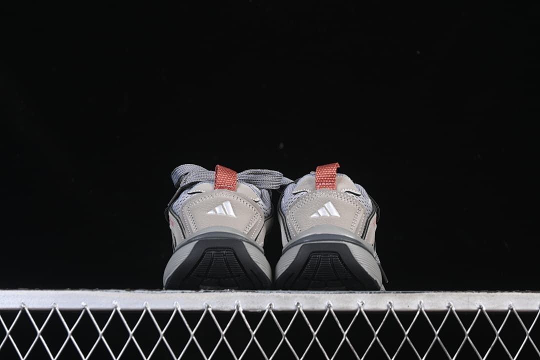 Rear view of the pair showing heel details and dark outsole sections.