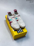 Pair of off-white Onitsuka Tiger low-top sneakers with burgundy and turquoise accents, photographed on a yellow box.