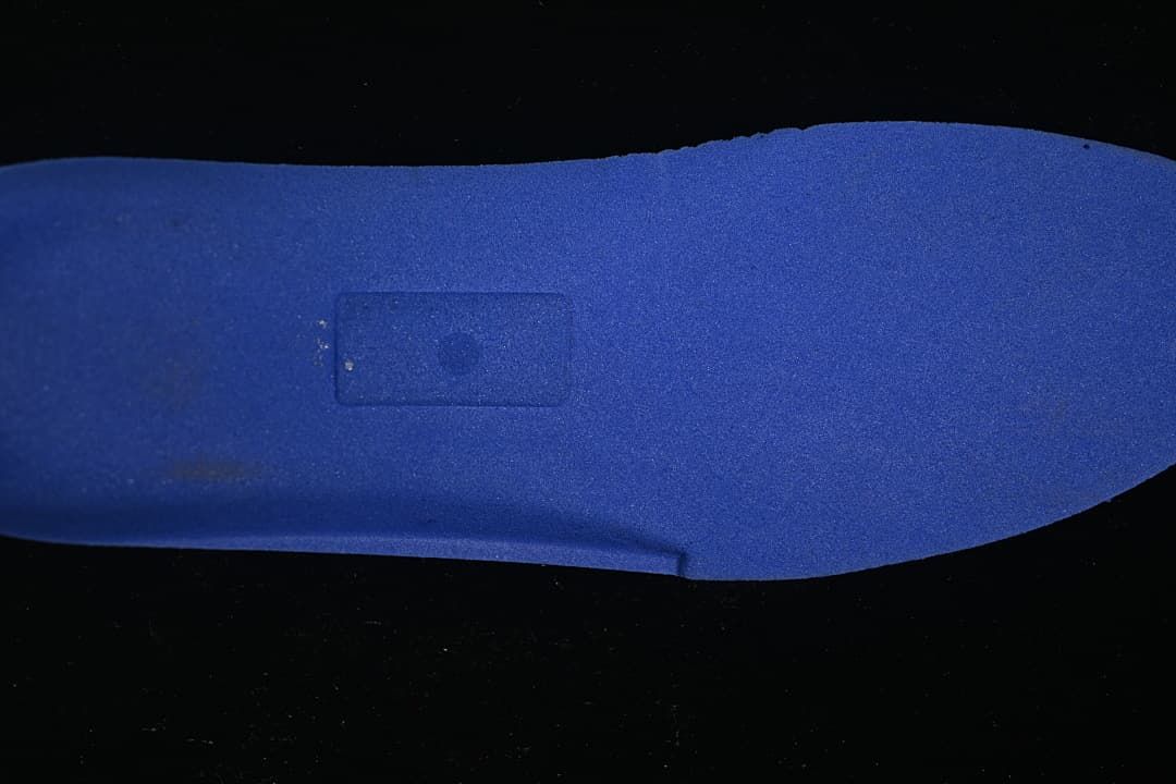 Blue footbed shown separately against a dark background.
