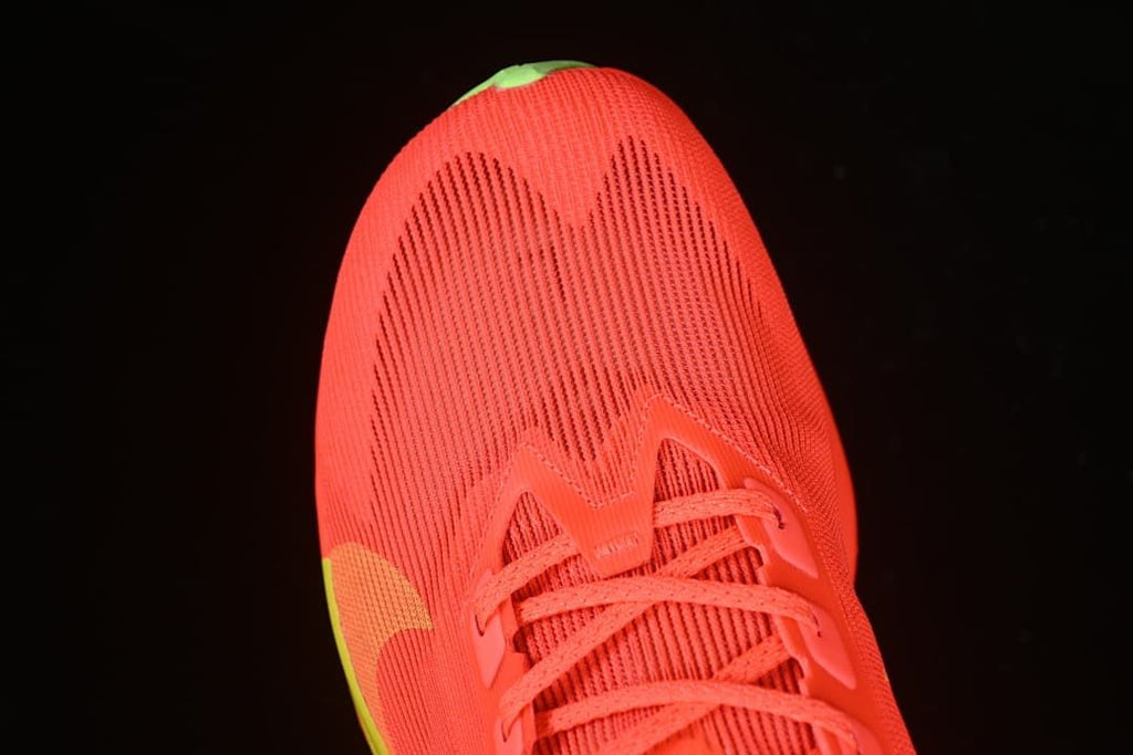 Top-down close-up of the toe box and laces.