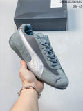 Gray Puma Speedcat The Open YY sneaker with a dark mesh-look panel and pale side stripe
