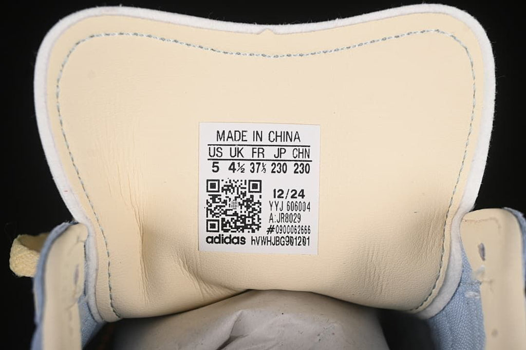 Tongue label showing shoe sizing and model code JR8029