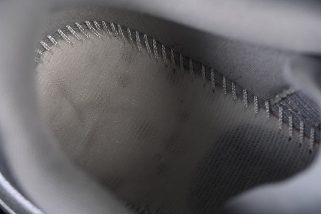 Close-up view inside the shoe showing the lining and stitching