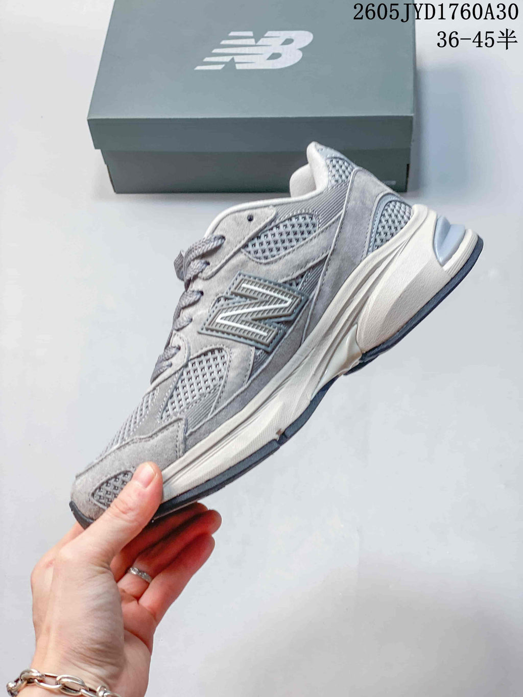 Side profile of a grey New Balance 2010 sneaker