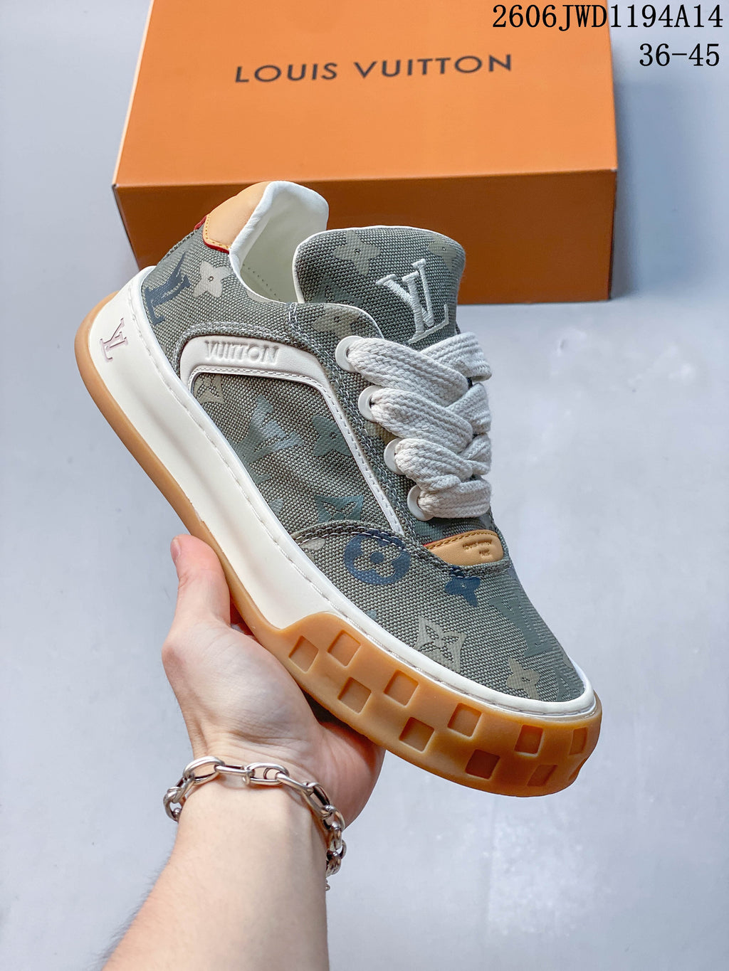 Angled side view highlighting the patterned upper, white laces, and two-tone sole.