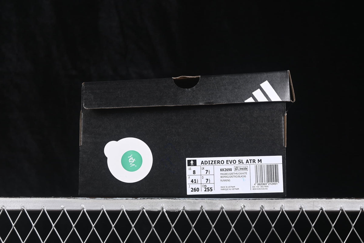 Adidas Adizero Evo SL shoe box showing the model label, KK2690 code, beige and cream color description, and a photographed EU 41 1/3 sample size.