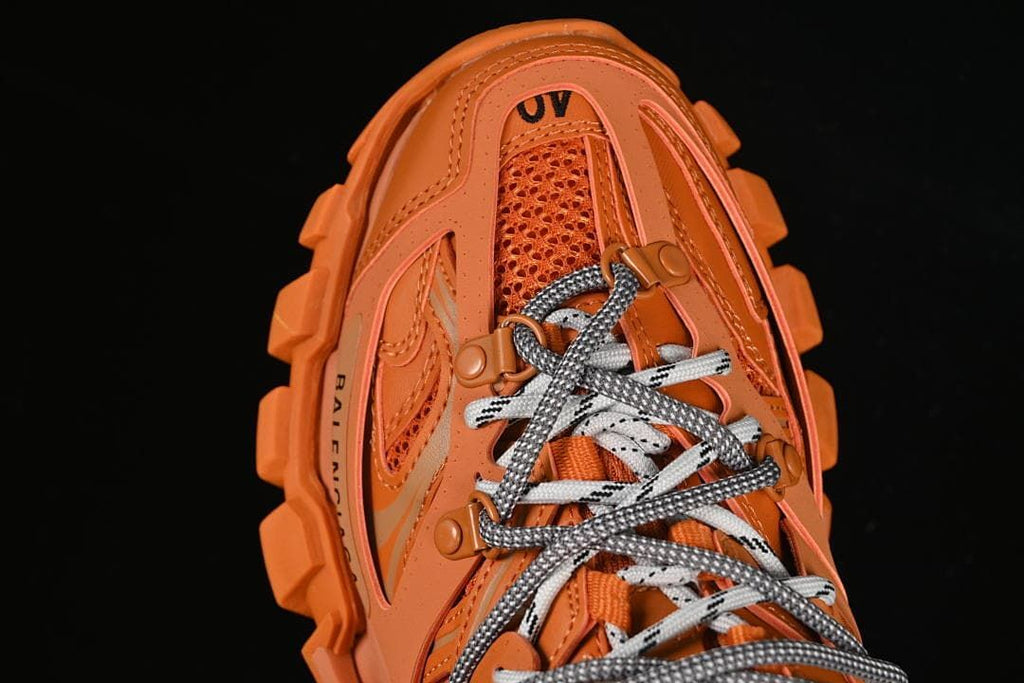 Top view showing the sneaker lacing and layered construction
