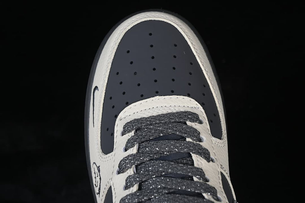 Top view of perforated dark toe and laces