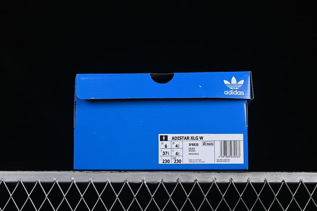 Blue shoe box label identifying Adistar XLG W, black, and style IF6935