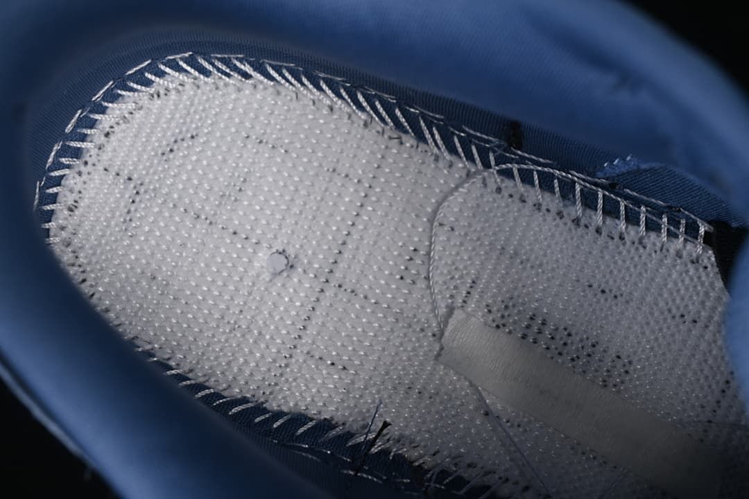 Close-up view inside the shoe showing the inner lining and stitching