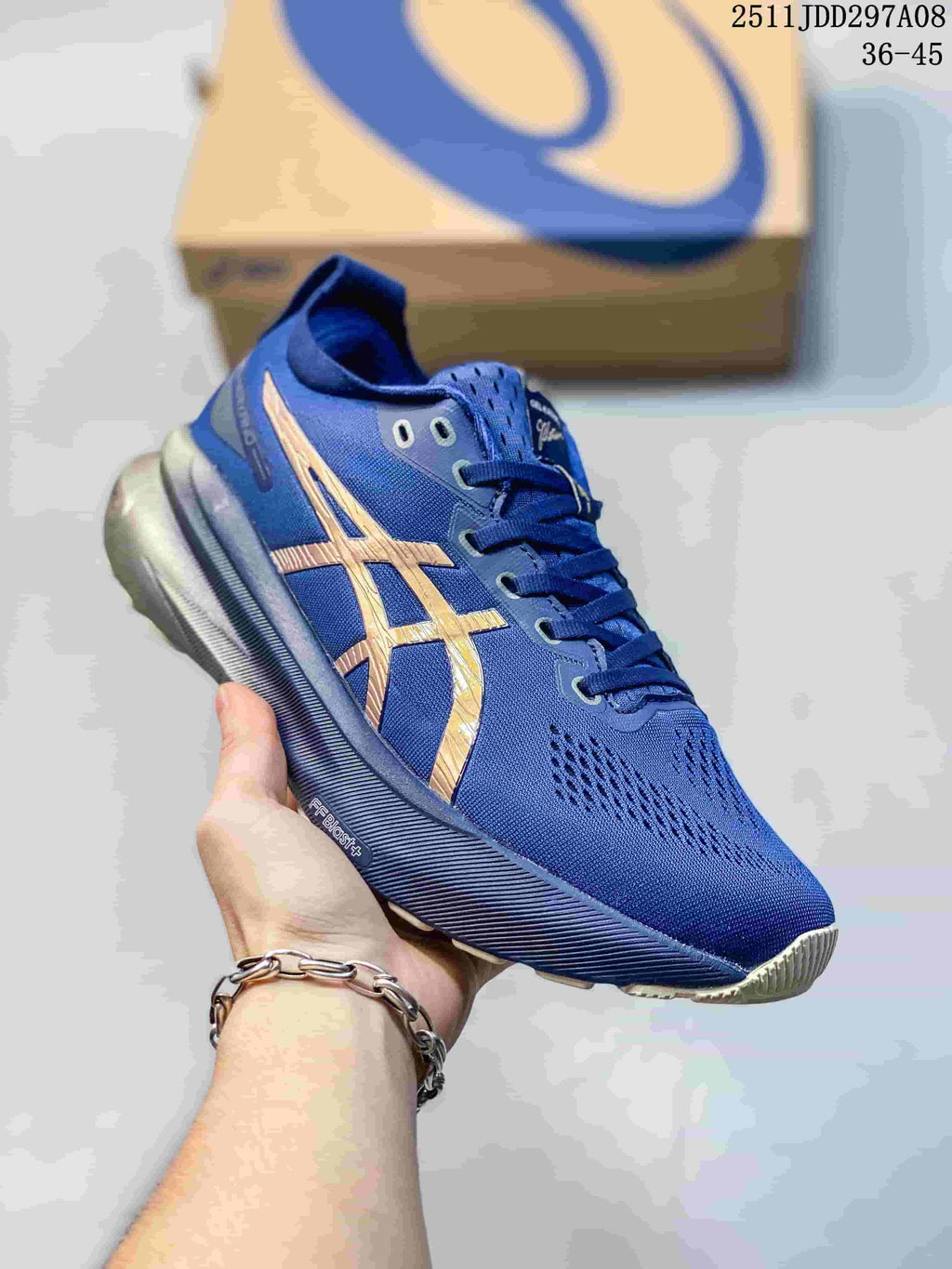 Side profile of the blue ASICS shoe with gold-tone stripes and visible FF BLAST+ marking