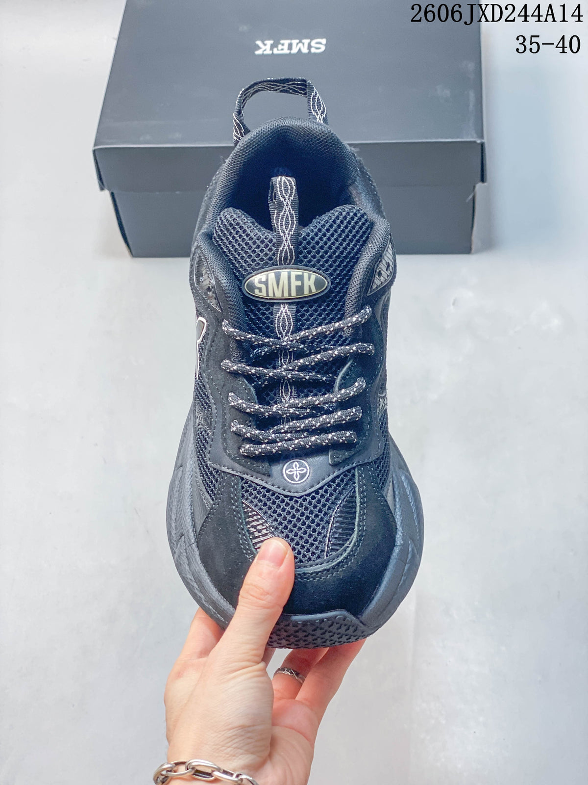 Front view showing the mesh upper and patterned laces