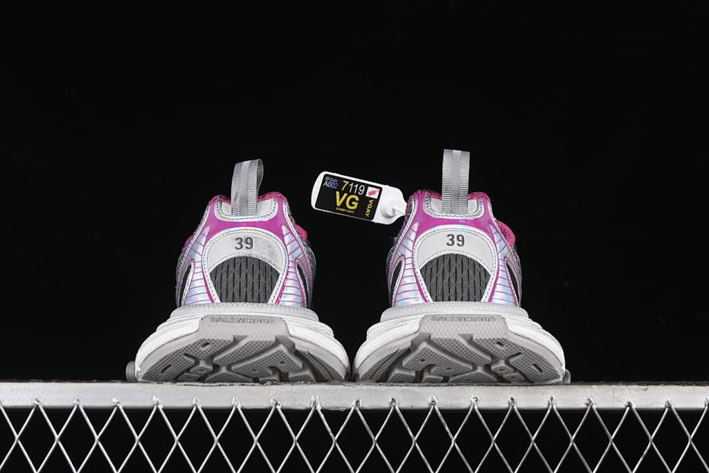 Rear view of both sneakers showing size 39 markings and outsole tread