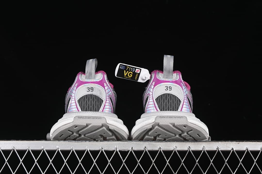 Rear view of both sneakers showing size 39 markings and outsole tread